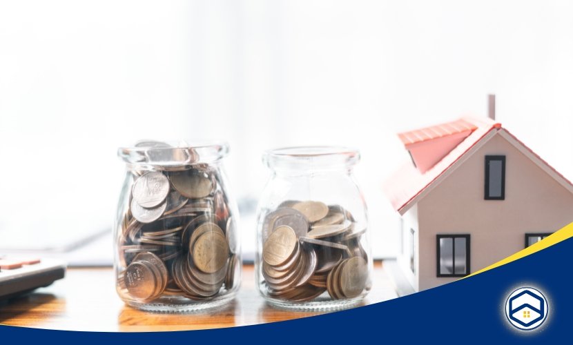 Two jars of coins next to a model house, symbolizing rental income