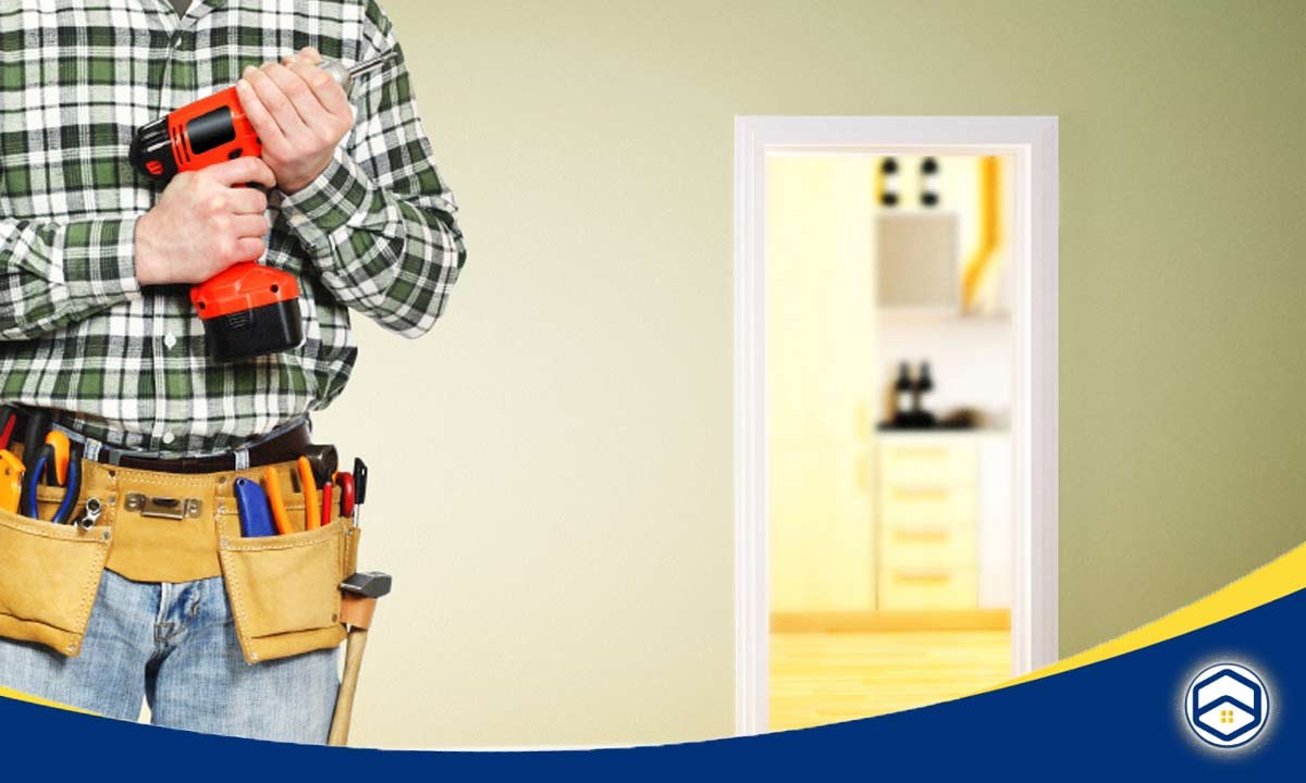 A construction worker in a plaid shirt holds a cordless drill leading apartment maintenance requests 