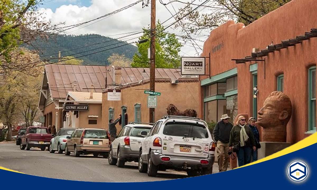 A scenic view of Canyon Road in Santa Fe, showcasing art galleries and adobe architecture, reflecting the vibrant culture of one of the best neighborhoods in Santa Fe