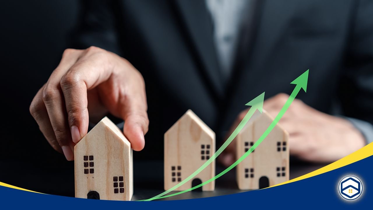 Hand placing wooden house blocks with upward green arrows, symbolizing growth and housing opportunities.