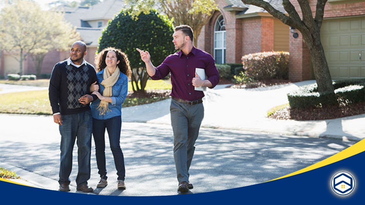 Agent showing a couple homes in a neighborhood.