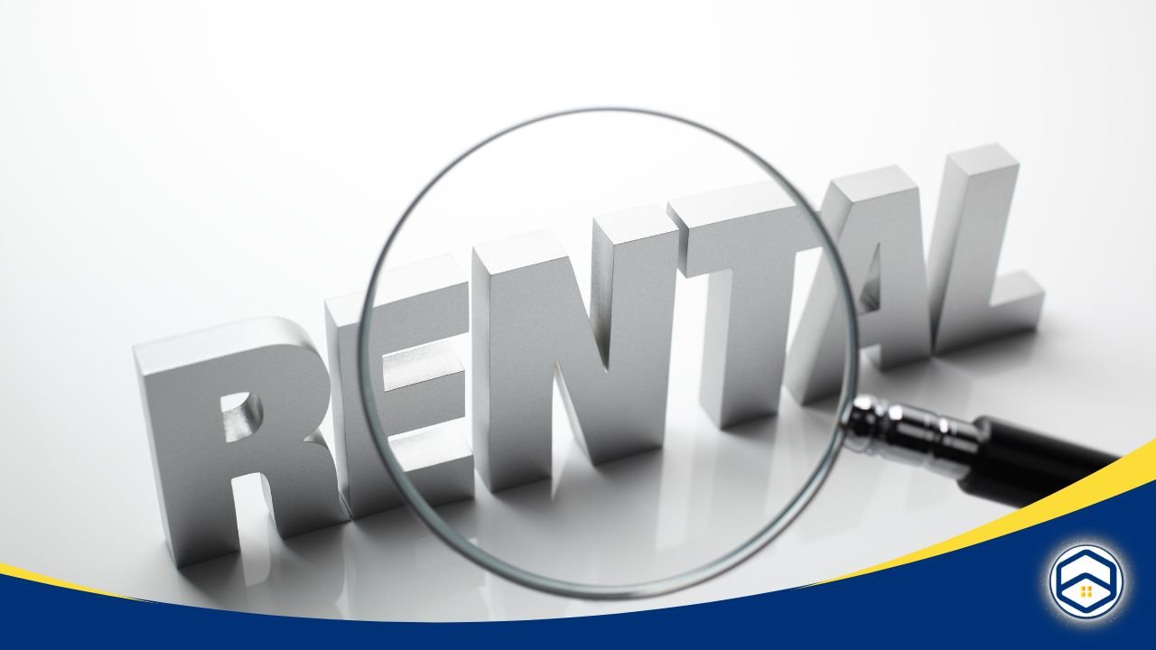 Large 3D text spelling 'RENTAL' with a magnifying glass highlighting the word, symbolizing a search for rental properties.