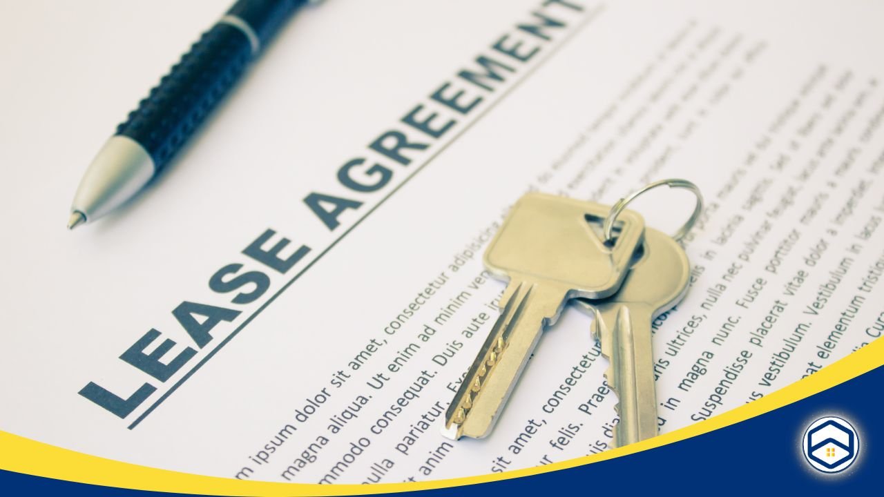 Lease agreement document with keys and a pen placed on top.