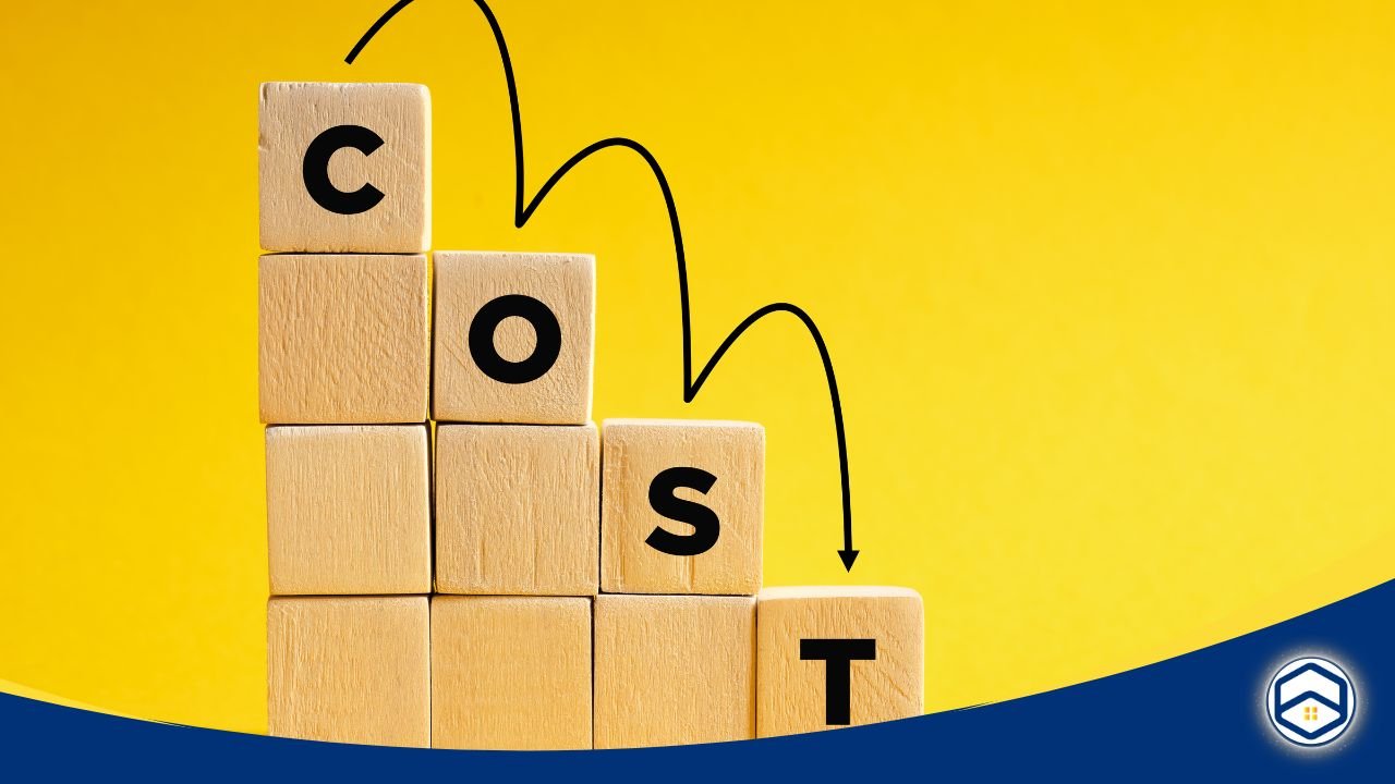 Wooden blocks spelling 'COST' with descending arrows on a yellow background, symbolizing reduced or manageable costs.