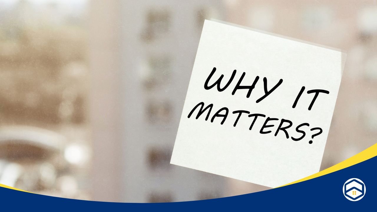 Sticky note with 'Why It Matters?' written on it, placed on a window with a blurred urban background.