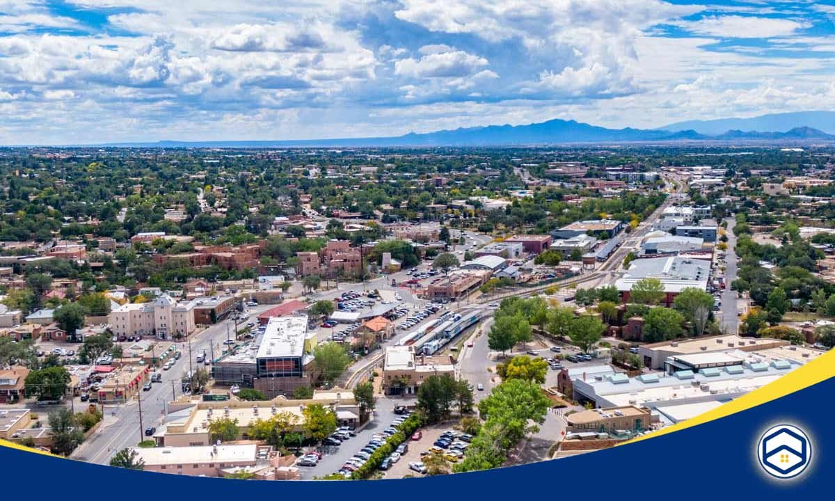 Aerial view of the vibrant Southside neighborhood in Santa Fe, New Mexico, showcasing a mix of affordable housing options, local businesses.