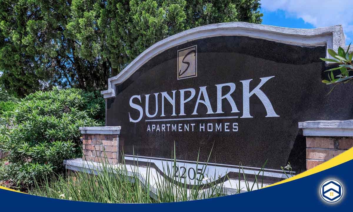 The image shows the entrance sign for the Sunpark Apartment Homes, which appears to be one of the "Top Conroe Apartments Offering Video Walkthroughs" mentioned in the blog topic.