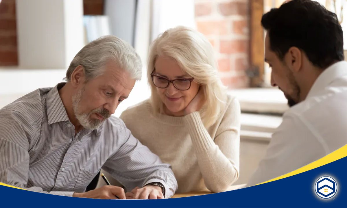 The image appears to show a couple, likely an older married couple, reviewing some documents together. 