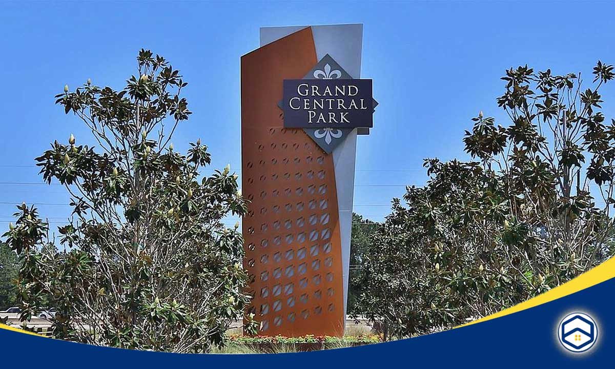 The image shows the sign for Grand Central Park, a park located in Conroe, Texas. The sign features the pa