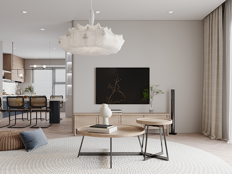 Stylish minimalist living room in Houston with natural light, sleek furniture, circular wood tables, and a neutral color palette, showcasing modern simplicity in home decor.